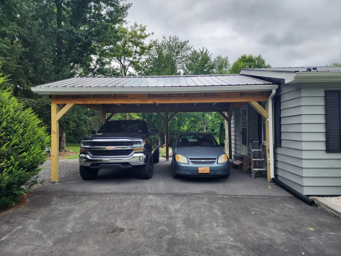 Timber-framed carport with metal roof built by Farrar’s